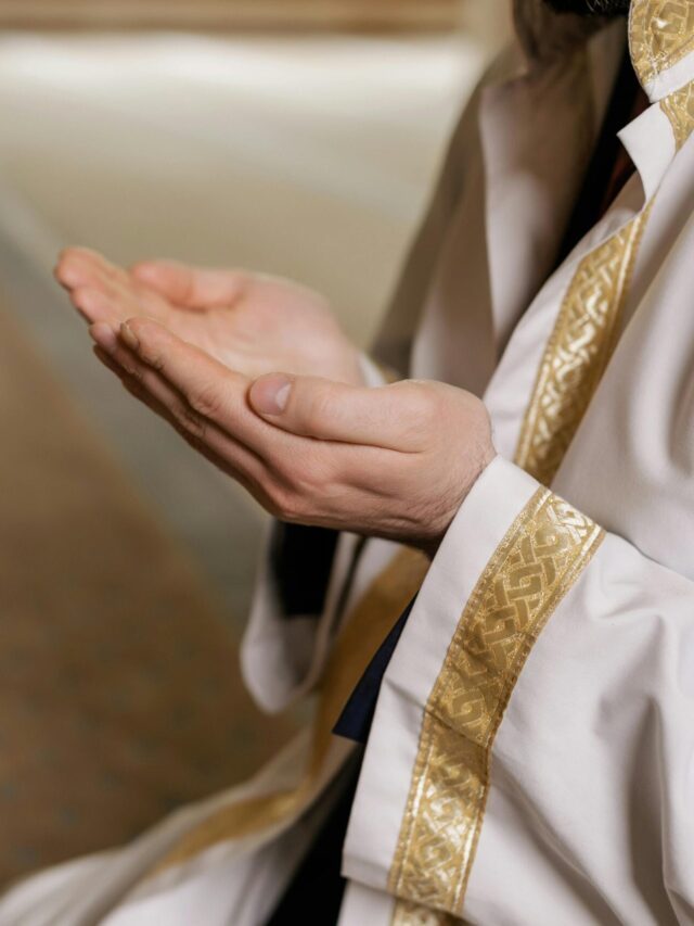 Person in Praying with His Hands Raised